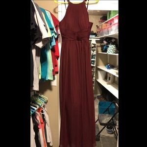 Long burgundy dress. Has padding in the boobs.